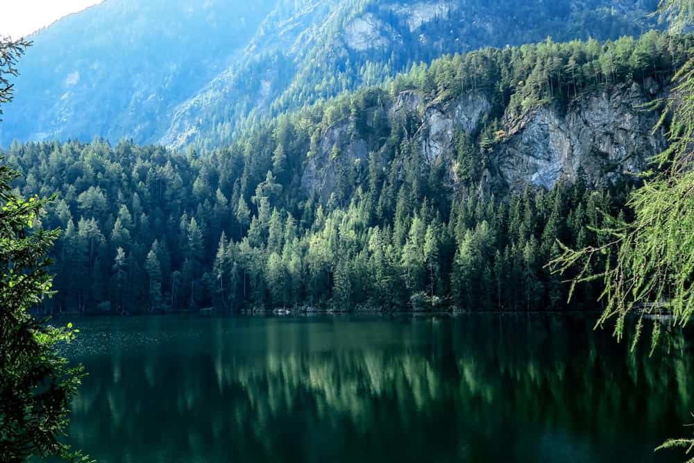 Beautiful image of the mountains, lake, and trees showcasing our environment. WindowFix is an environmentally friendly company.