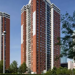 This is an images of the high rise red brick condominium Park Side East in Jersey City, New Jersey.